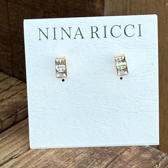 NWT Nina Ricci gold-plated studs featuring channel-setSwarovski crystals